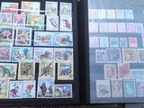 a book with a lot of stamps inside of it