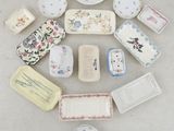 many different types of plates and bowls on the table