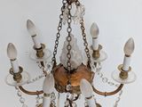 a chandelier that has many lights hanging from it
