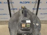 a close up of a metal object with a radio on top of it