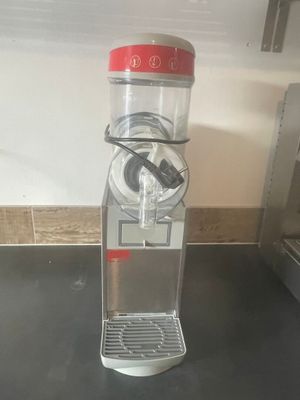 a machine that is sitting on a counter in a kitchen