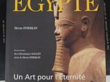 an image of a book with a picture of an egyptian statue on the cover