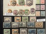 many different types of stamps on display in a display case