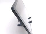 a close up of a cell phone on a stand