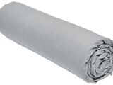 a close up of a roll of grey fabric on a white background