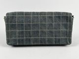 an image of a gray and white checkered purse