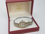an image of a lady ' s watch in a box on a white surface