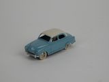 a toy car that is sitting on a white surface