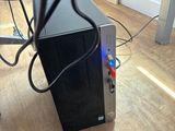 a computer that is sitting on the floor in the room
