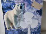 the box of a white polar bear fan sitting on top of a table