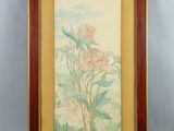 une peinture représentant des fleurs, dans un cadre en bois, sur fond blanc