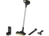 a black and white photo of a cordless vacuum cleaner