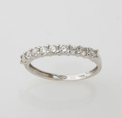 an 18k white gold diamond ring