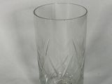 a shot of a glass with a small amount of water in it