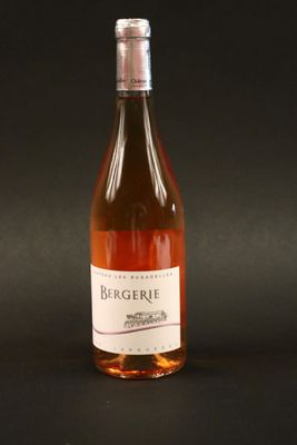 a bottle of wine that is sitting on a table