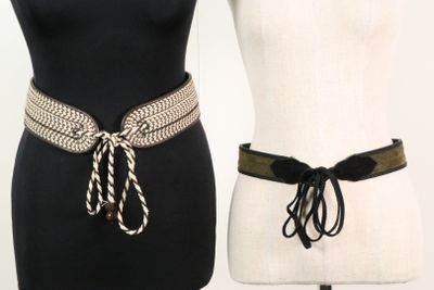 two mannequins that are wearing belts on a mannequin