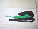 a picture of a picture of a black cat with a green tail