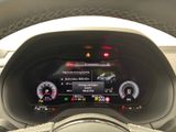 the dashboard of a car with a digital display in the center