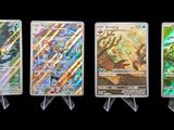 four different types of pokemon cards are displayed on a black background