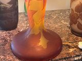 three vases that are sitting on a table