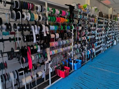 a lot of different types of ribbons on the wall