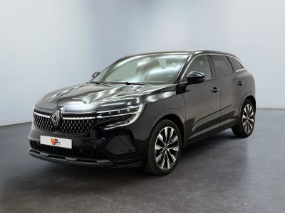 a black suv parked in a room with a white wall