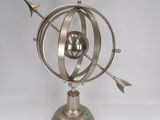 a metal object with an arrow on top of it