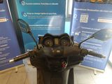 a motor scooter that is parked in a building