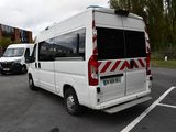a white van that is parked in a parking lot