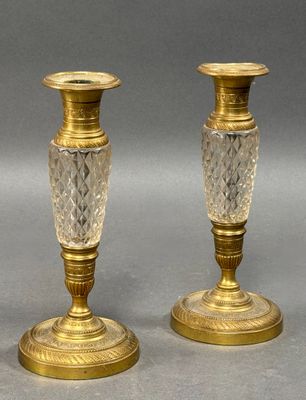 pair of antique brass and cut glass candlesticks