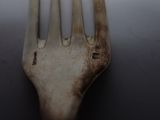 a fork that has been left on the table