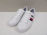 white leather sneakers with red, white and blue stripes