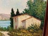 painting of a house by the water with a path leading to it