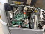 a truck with a large engine in the back of it