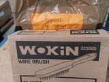 a box with a brush on top of it sitting on a table
