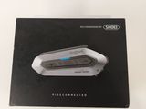 an image of a black and white photo of a cell phone in a box
