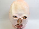 a white mask with a nose and nose on a white background
