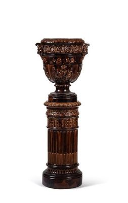 an image of a wooden pedestal with a planter on top of it