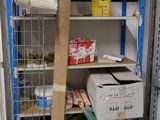 a small pantry with a ladder and shelves full of food