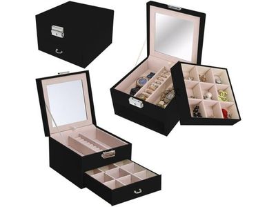 trois boîtes à bijoux noires avec des compartiments et des miroirs, sur fond blanc