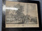 framed picture of a group of people in a village with a horse drawn carriage