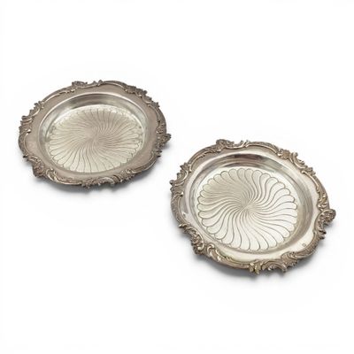 pair of silverplated trays with floral designs on each side