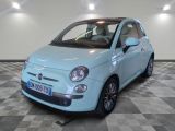 la photo d'une petite voiture bleue garée dans un garage
