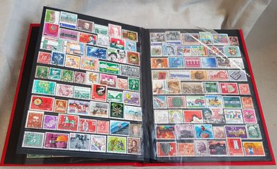 a book with a lot of different stamps on it