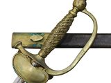 a close up of a sword that is on a pole
