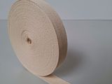 a close up of a roll of cloth on a table