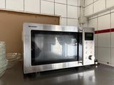 a microwave that is sitting on a counter in a kitchen