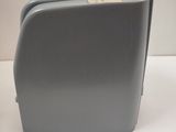 a gray suitcase that is sitting on a table