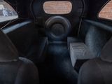 a view of the inside of a car from the passenger seat