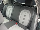 two seats in the back of a car that are empty